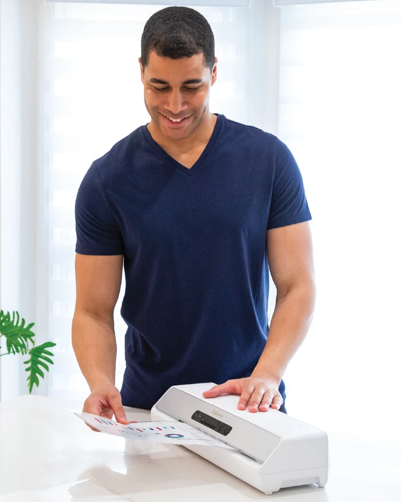 Man using a laminator